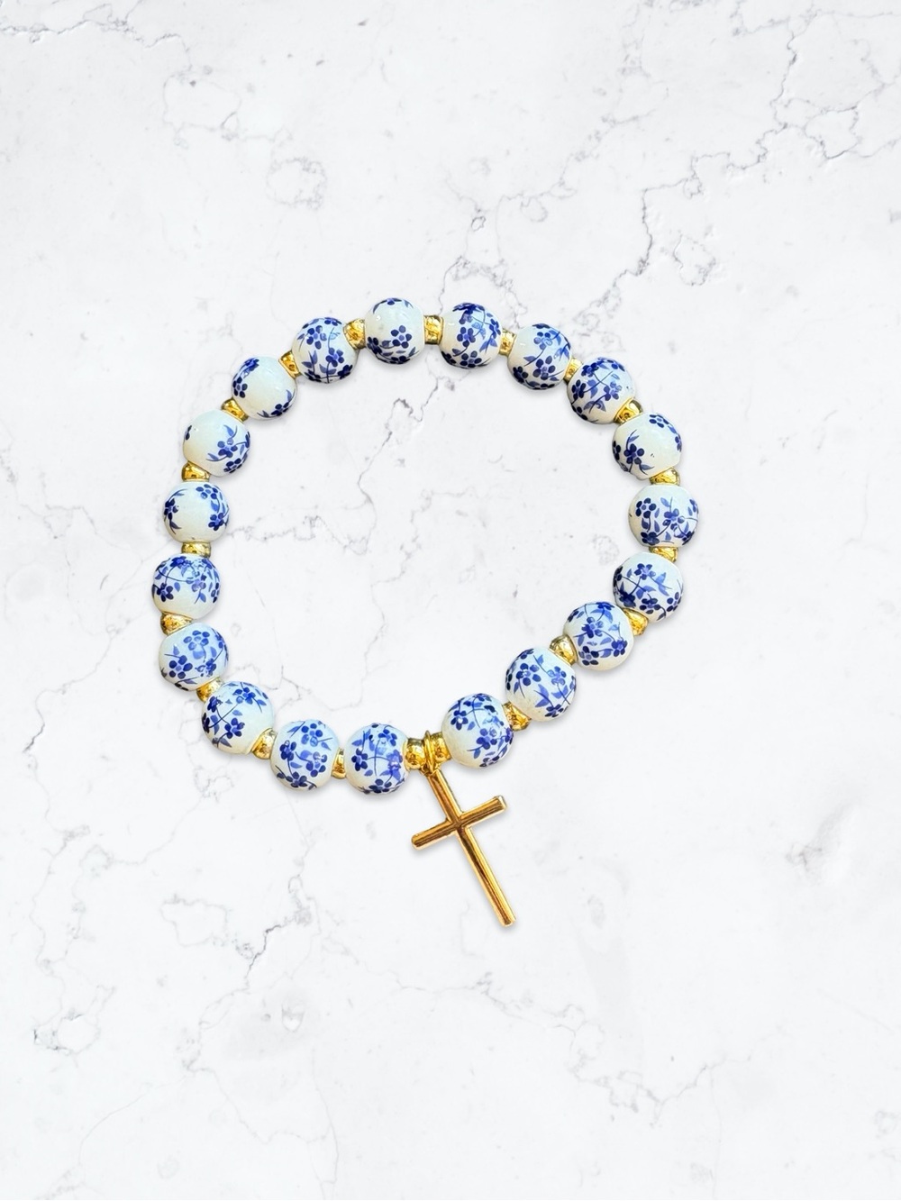 Gold Cross Bracelet with Glass Blue Floral Beads